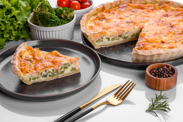 Delicious fresh quiche with broccoli, salmon and cheese