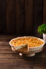 Delicious fresh quiche with broccoli, salmon and cheese