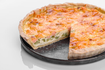 Delicious fresh quiche with broccoli, salmon and cheese