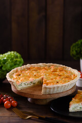 Delicious fresh quiche with broccoli, salmon and cheese