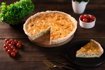 Delicious fresh quiche with broccoli, salmon and cheese