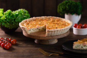 Delicious fresh quiche with broccoli, salmon and cheese
