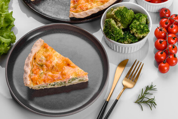 Delicious fresh quiche with broccoli, salmon and cheese