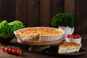 Delicious fresh quiche with broccoli, salmon and cheese