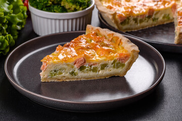 Delicious fresh quiche with broccoli, salmon and cheese