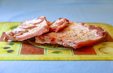 Juicy appetizing pork ribs ready to fry for lunch or dinner