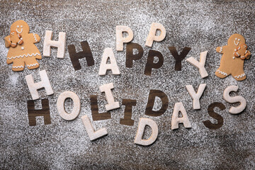 Wooden Background Happy Holidays Written With Cookie Dough - Powered by Adobe