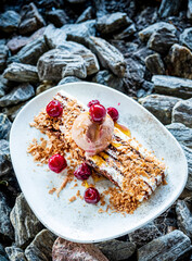 Christmas dessert with ice cream and cherries