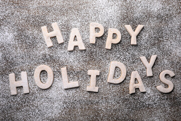 Wooden Background Happy Holidays Written With Cookie Dough