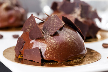 delicious chocolate cake covered with milk chocolate