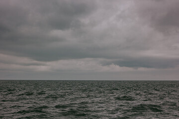 Heavy clouds over the gray sea