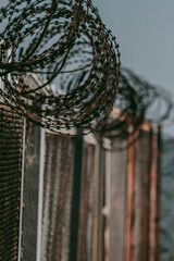 Bends and lines of barbed wire