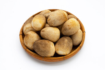 Straw mushroom on white background.