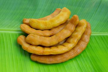 Tamarind pickled fermented on banana leaf