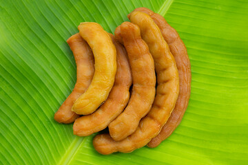 Tamarind pickled fermented on banana leaf
