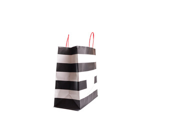 black and white striped paper shopping bag, isolated