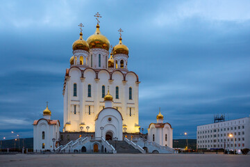 View of the large cathedral. Cathedral of the Holy Trinity in the city of Magadan. Russian Orthodox Church in the Far East of Russia. A beautiful architectural landmark of Magadan. Magadan Region.