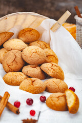 Homemade tangerine cookies on wooden rustic table. Close up