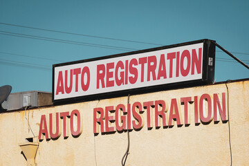Old worn auto registration sign