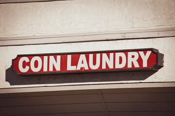 Old urban coin laundry sign