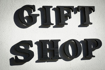 Urban gift shop sign on building