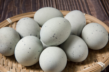 preserved duck eggs or Century egg on wood background