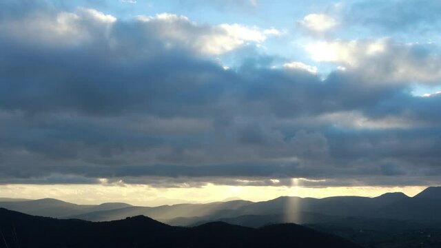 4k Sunset cloudy sky timelapse with beautiful sun rays