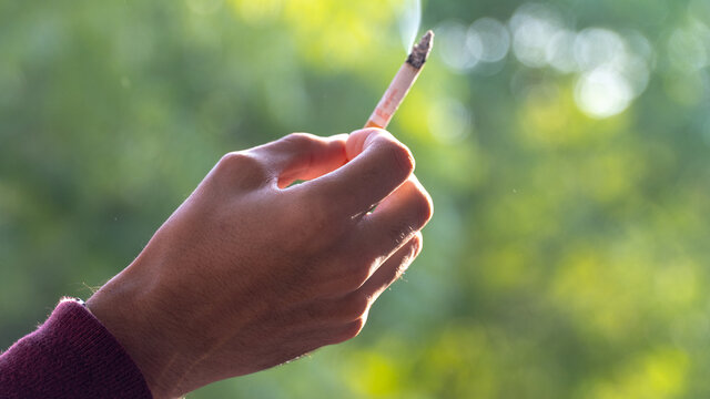 Young boy inhaling Cigratte, Smokers, Smoking cigratte and Drug Addicted people