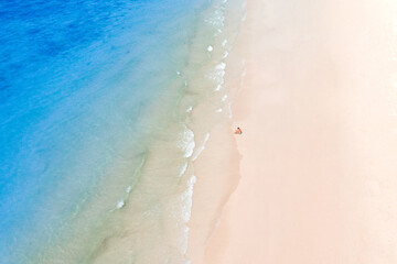 Fototapeta na wymiar High angle view of the sea and sandy beach on the island, beautiful blue water.
