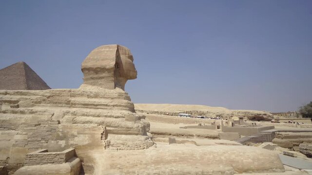 Famous egyptian sphinx with Great pyramid in Giza, Cairo, Egypt