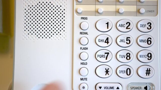 Dialing 411 on Wall Phone