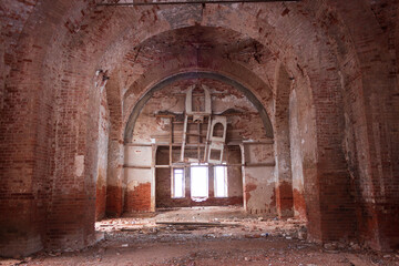 inside an abandoned church with an iconostasis