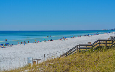 Fototapeta na wymiar Beautiful white sand beach of Miramar Beach on the Gulf of Mexico in South Walton, Florida