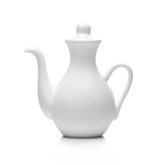 White gravy boat isolated on white background. Vertical. Studio shot.