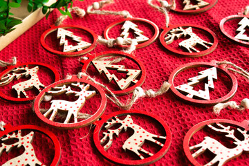 Christmas wooden decorations on red background