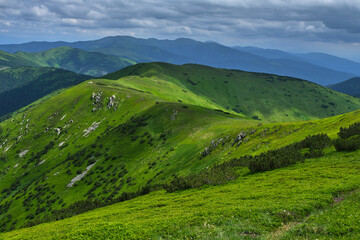 Obraz premium Low Tatras - green hills in the play of lights and shadows