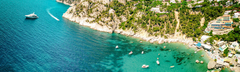 Panoramic aerial view of Marina Piccola Beach in Capri from drone, Italy in summer season