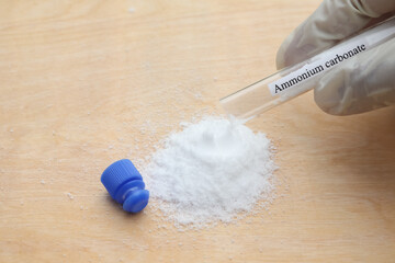 ammonium carbonate in test tube