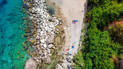 Overhead aerial view of beautiful mediterranean beach and coastline in summer season. Travel concept