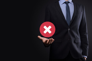 Hand holds icon,cancellation symbol,cancel icon.Cross mark flat red icon.round X mark.cancel...