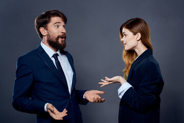 business man and woman gesturing with hands together communication team