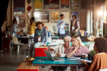 Group of employees brainstorming together