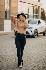 Young woman travelling by car