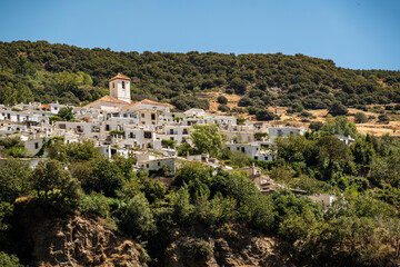 Scenic view of the village of Capileira, seen from the other side of the Poqueira valley, Las Alpujarras, Sierra Nevada National Park, Andalusia, Spain