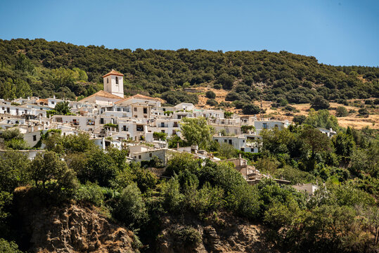 Scenic view of the village of Capileira, seen from the other side of the Poqueira valley, Las Alpujarras, Sierra Nevada National Park, Andalusia, Spain