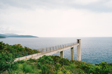 Fototapeta na wymiar Bridge on the coast of the Bay of Kotor. Montenegro