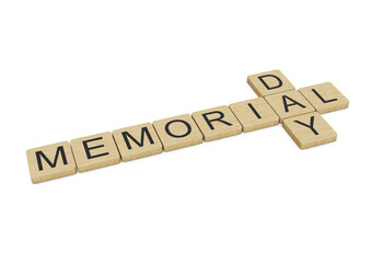 Memorial Day written with wooden letters, isolated on white background