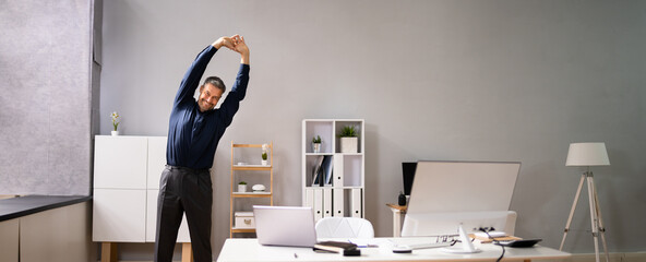 Arms Stretch Exercise Standing Near Desk