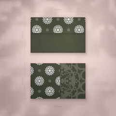 Dark green business card with Greek white pattern for your brand.