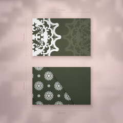 Dark green business card with Greek white pattern for your contacts.